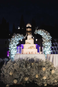 Italian Wedding Villa Selvatico elegant cake setup flower arch