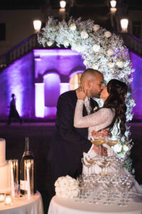 Italian Wedding Villa Selvatico elegant cake setup flower arch champagne tower